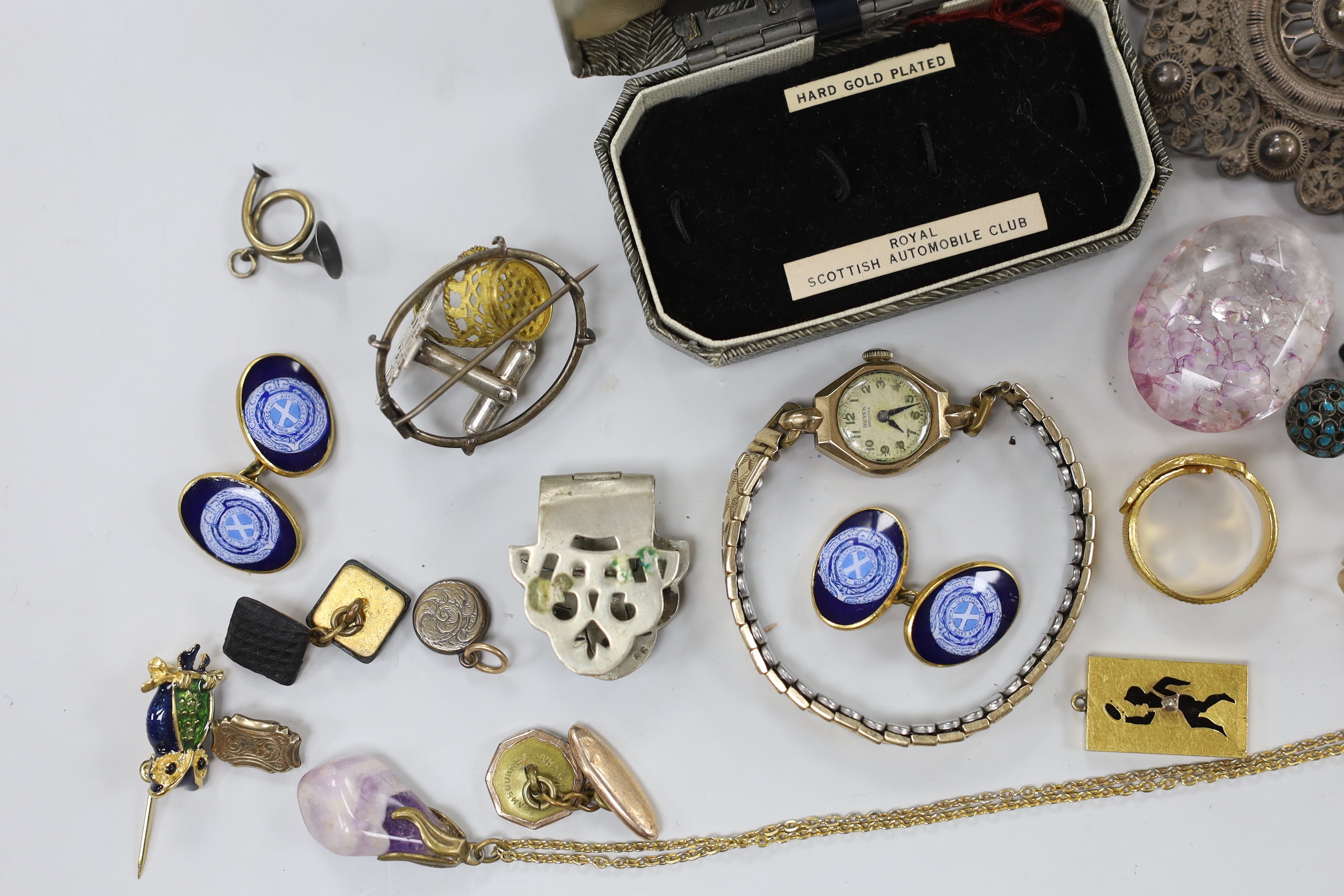 A pair of engraved 10ct oval cufflinks, 3.8 grams, two yellow metal and diamond chip set 'silhouette' charms and a quantity of sundry jewellery etc. including a lady's 9ct Buren wrist watch, Royal Scottish Automobile Clu